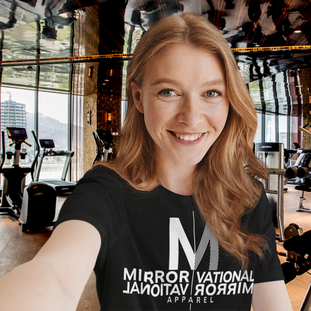 Redheaded woman taking a selfie at the gym - Mirrorvational.com