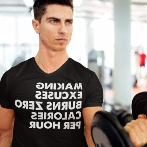 Man doing bicep curls at the gym - Making excuses burns zero calories per hour