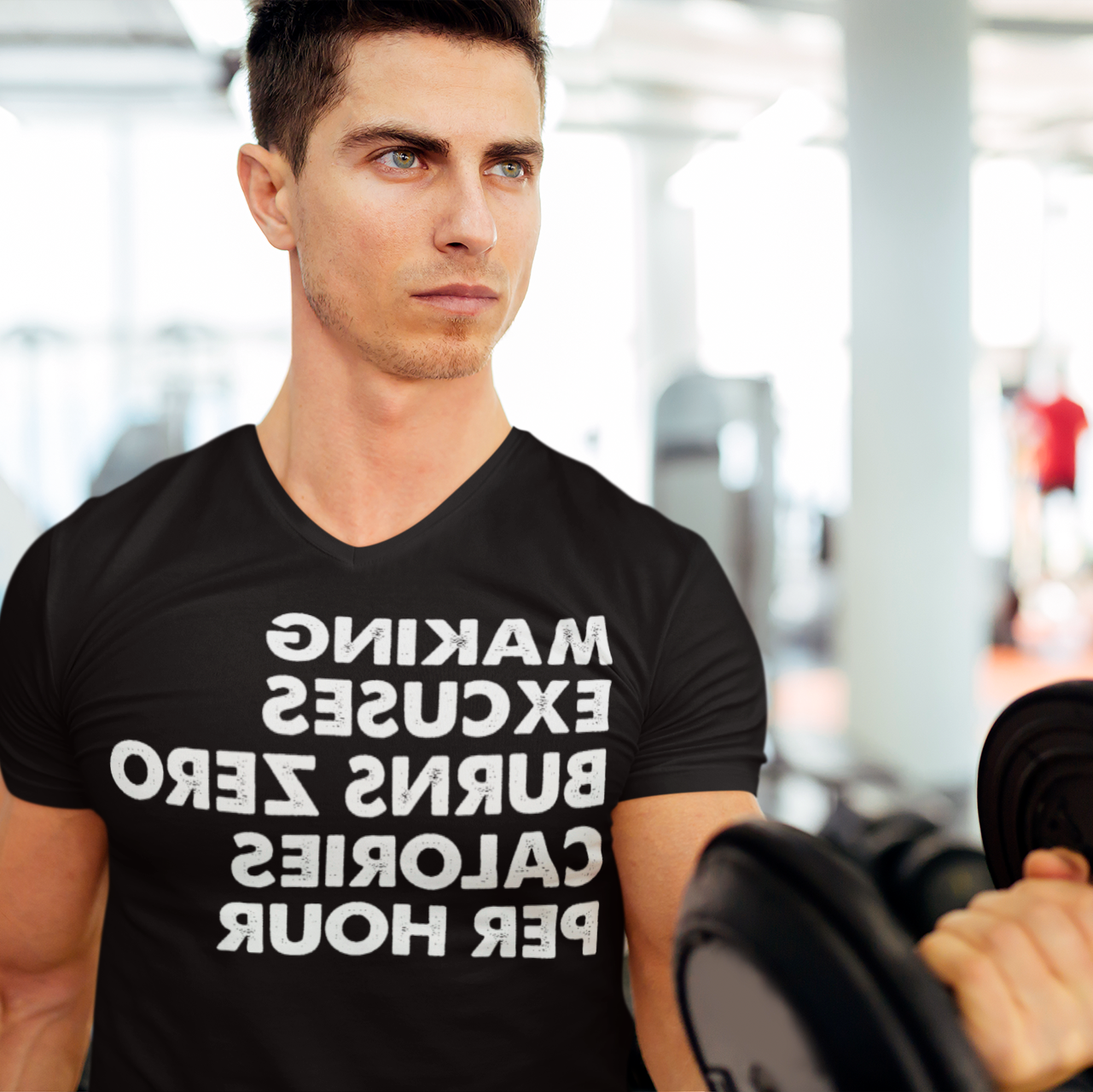 Man doing bicep curls at the gym - Making excuses burns zero calories per hour